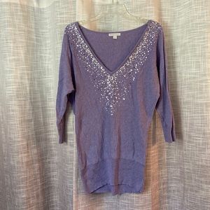 Dazzling deep V purple sweater with sequins accents